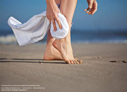 peclavus® feet on the beach, Advertising - a graphical file, rectangular