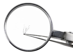 Tweezers with magnifying glass
